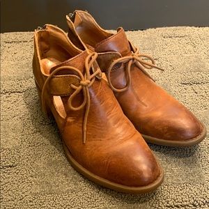 100% leather booties with zipper and ties!